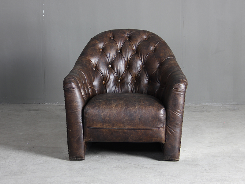 single leather sofa with fabric cushion